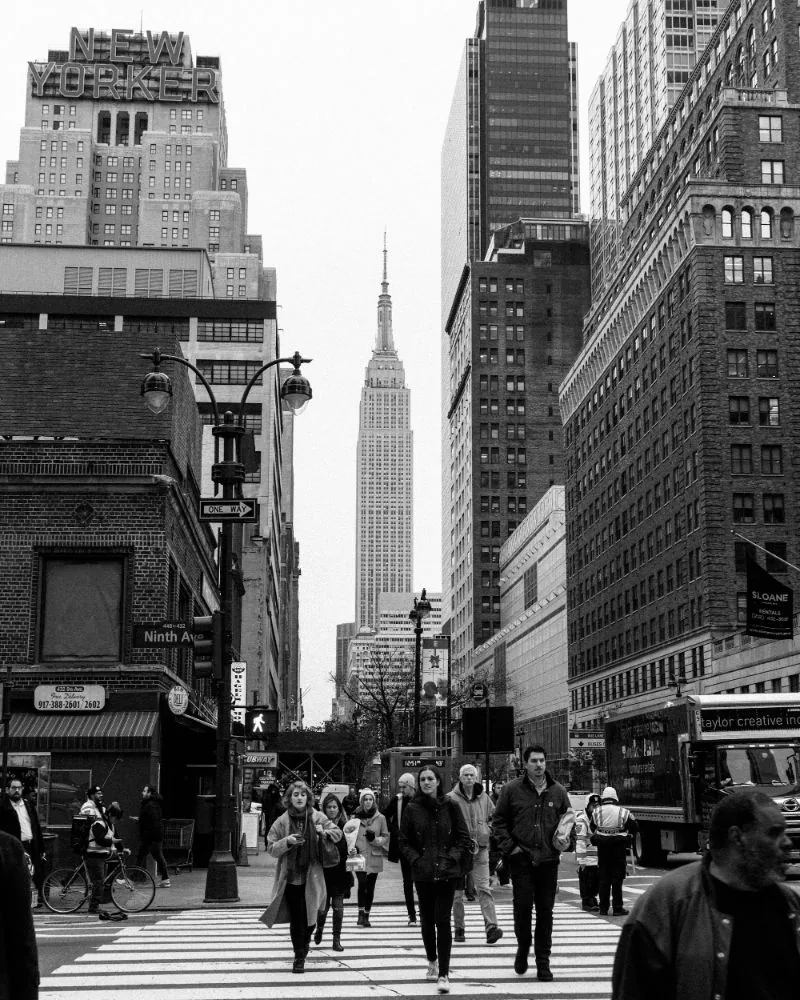 Placeholder: a New York avenue lined with tall buildings